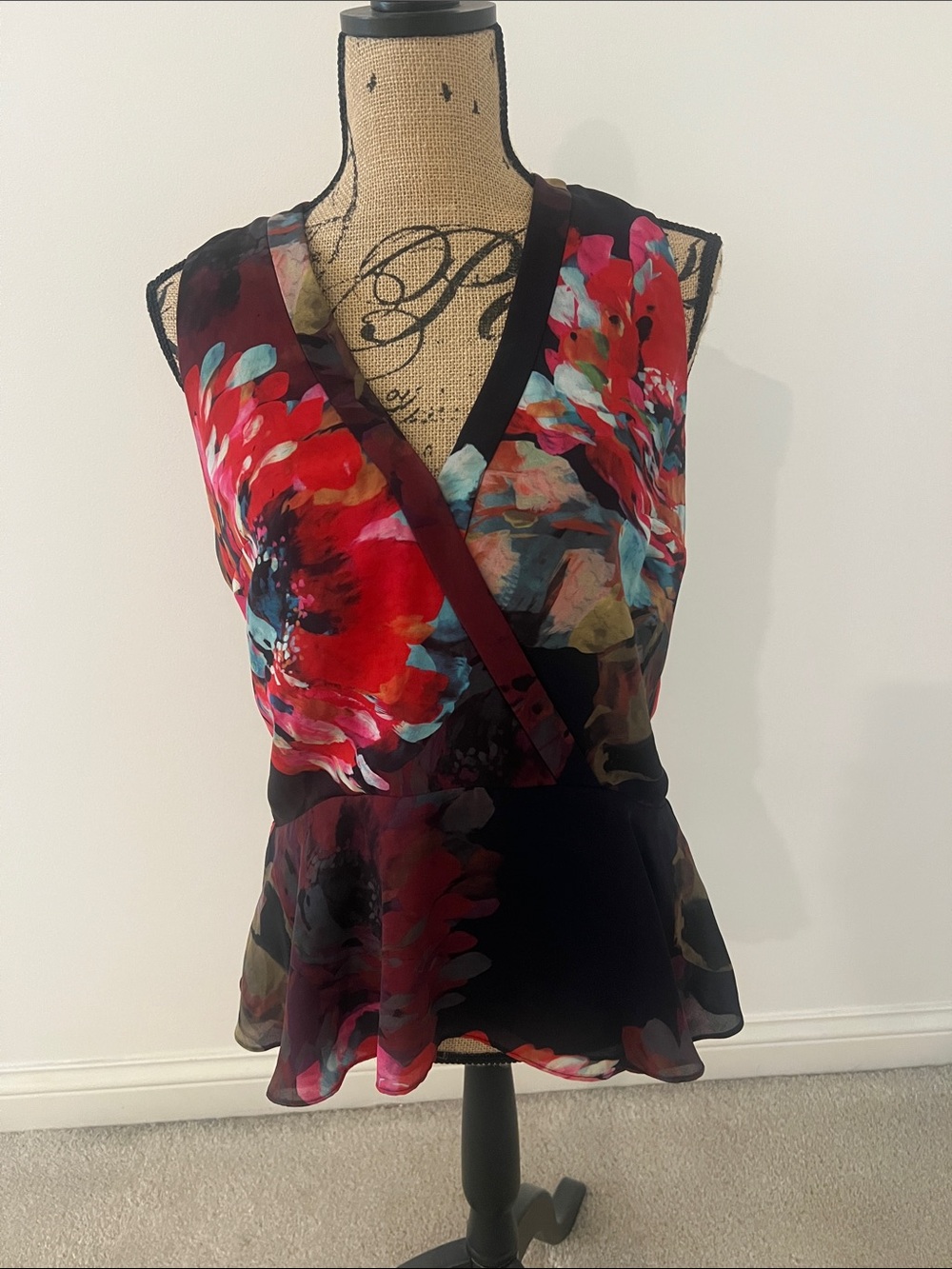 Trina Turk Black Floral Peplum Top with Red and Teal Accents